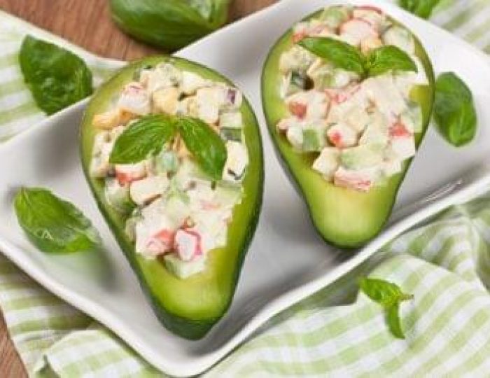 Keto-Diet-Sample-Avocado-stuffed-with-crab-cucumber-egg-red-onion-and-sauce-mayonnaise-on-white-plate