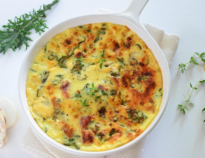 Healthy kale and bacon frittata with mushrooms and thyme makes a light lunch or dinner