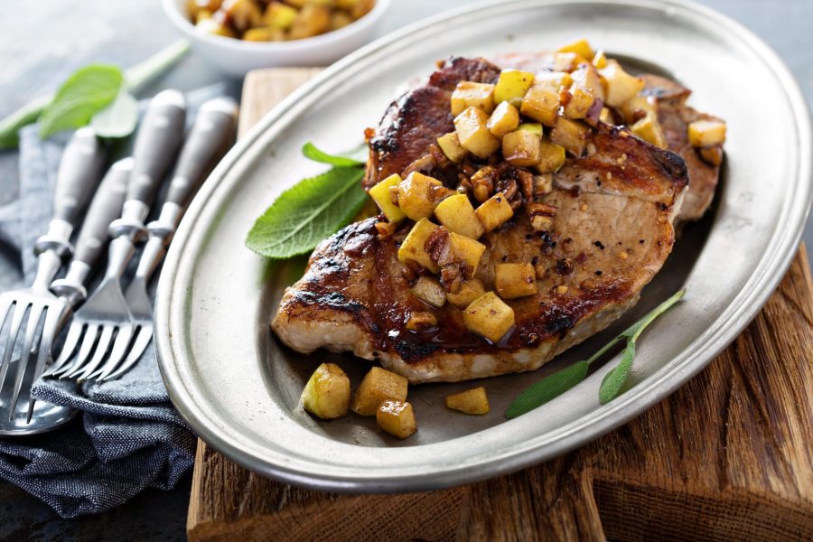 Sauteed pork chops with caramelized apples and walnuts